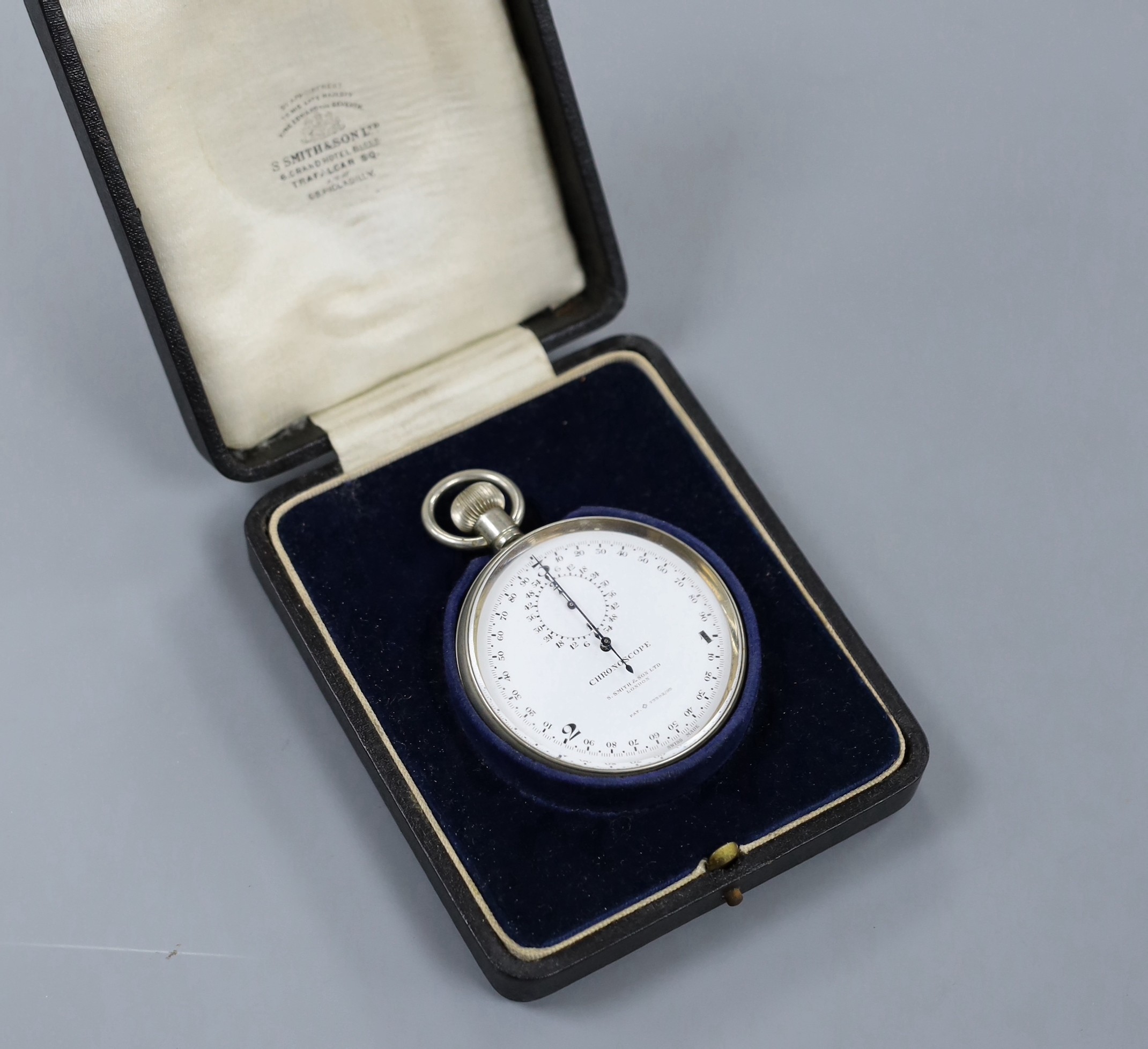 A cased military issue S. Smith & Son Ltd nickel cased chronoscope (chronograph), case back engraved with broad arrow and No. 252-368, case diameter 57mm